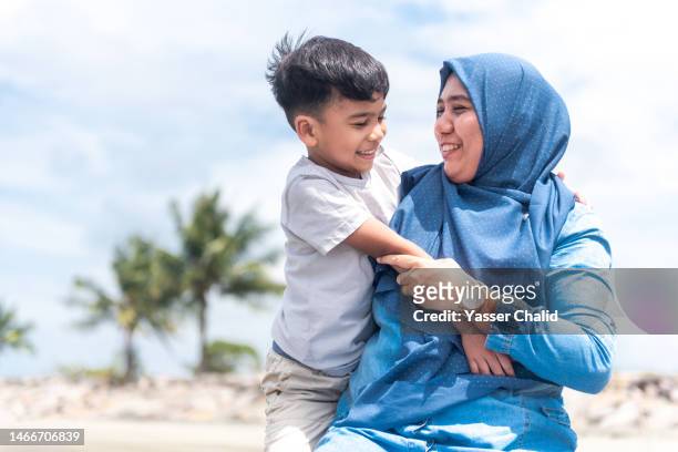 Little Boy Hugging His Mother